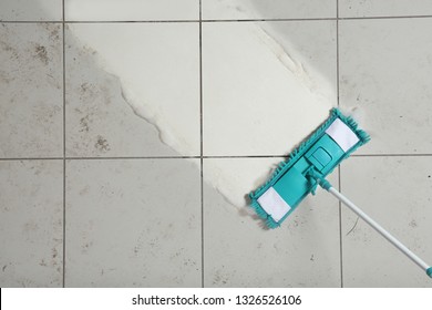 Washing Of Dirty Floor With Mop, Top View. Space For Text