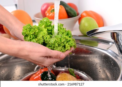 Washing fruits and vegetables close-up