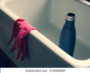 Washing Up Gloves And Water Bottle In Belfast Sink