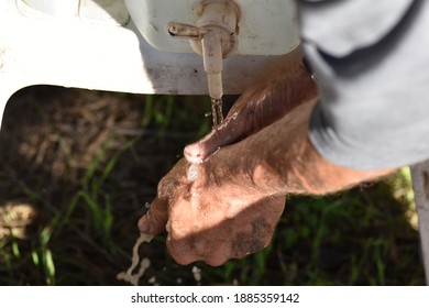 Washing Hands After A Day In The Field