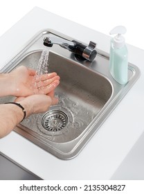 Washing hands in the sink