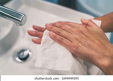 Washing Hands Steps For Personal Hygiene COVID-19 Prevention Drying Hand With Paper Towel After Handwash. Coronavirus Infection Preventive Cleaning.