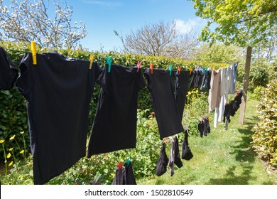 Washing Line With Clothes Drying In A Garden