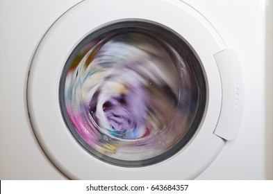 Washing Machine Door With Rotating Garments Inside