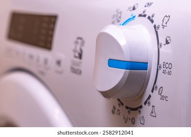 Washing in a washing machine, ecological program, saving energy and water washing machine in the bathroom