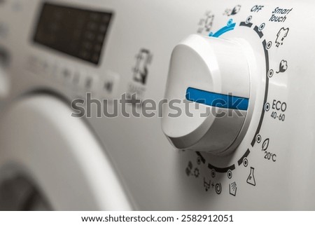 Washing in a washing machine, ecological program, saving energy and water washing machine in the bathroom