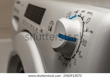 Washing in a washing machine, ecological program, saving energy and water washing machine in the bathroom