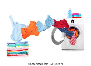 Washing Machine And Flying Clothes On White Background