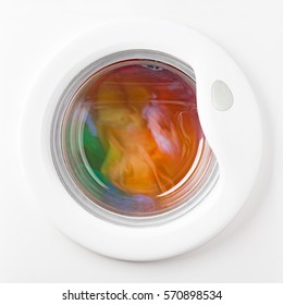 Washing Machine Running The Spin Cycle With Colored Clothes