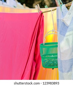 Washing On The Line With Colorful Pegs