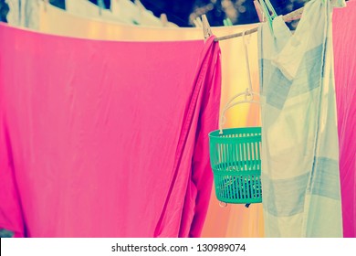 Washing On The Line With Colorful Pegs In Vintage Tone