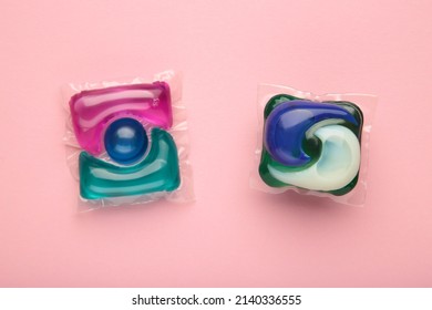 Washing Powder In Capsules On A Pink Background. Top View.