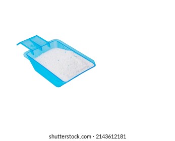 Washing powder dispenser with dry washing powder inside. Isolated on a white background.