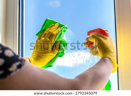 Washing windows spring cleaning. Selective focus. nature.