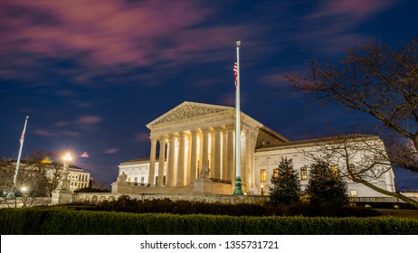 Washington DC—March 19, 2019; Landscape Of Front Steps And Entrance To United States Supreme Court Building At Night Where Justices Hear Cases Significant To Interpretation Of Laws And Constitution.