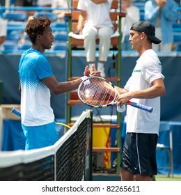 WASHINGTON - AUGUST 4: Top Seed French Gael Monfils (L) And American Ryan Sweeting Shake Hands After Their Match At The Legg Mason Tennis Classic On August 4, 2011 In Washington.