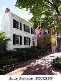 Washington DC - 13 August 2013: Typical Georgetown Washington DC Street Scene On O Street NW With White Painted House With Flag