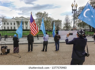 WASHINGTON, DC - APR. 4, 2019: Protesting China's Religious Persecution Of Ethnic Uyghurs & Turkic Muslims In East Turkistan; Including Mass Detention In Concentration Camps, & Kidnapping Of Children.