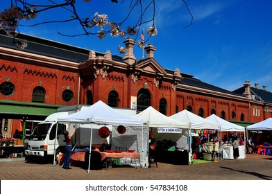 Washington, DC - April 12, 2014:  Vendor's Tents And The Historic Eastern Market Great Hall On Seventh Street SE  