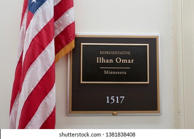 WASHINGTON, DC - APRIL 26, 2019: US HOUSE REPRESENTATIVE Ilhan Omar MINNESOTA - Office Entrance Sign And Flag - LONGWORTH HOB