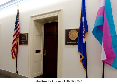 WASHINGTON, DC - APRIL 26, 2019: US HOUSE REPRESENTATIVE Ilhan Omar - Office Entrance With Sign And Flags