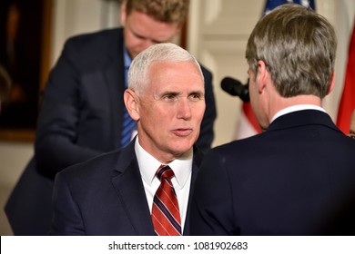 WASHINGTON, DC - APRIL 27, 2018: Mike Pence Vice President Of The United States Converses As He Exits A Joint Press Conference With President Donald Trump And Chancellor Angela Merkel Of Germany.