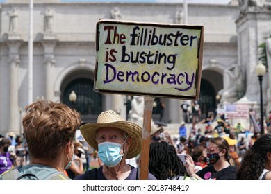 Washington, DC – August 02, 2021: A protester holds a misspelled sign at the Poor People's Campaign demonstration at Union Station advocating for passage of the pending Voters Rights legislation.
