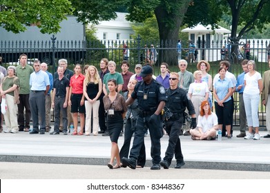 WASHINGTON DC, AUGUST 25: Protesters Of The Keystone Pipeline Are Arrested In Front Of The White House On August 25, 2011 In Washington.