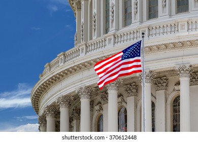 Washington DC Capitol dome detail with waving americanstar and stripes flag - Shutterstock ID 370612448
