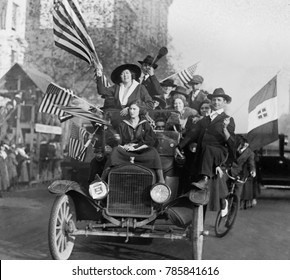 Washington, DC, Celebration Of The Armistice Ending World War 1, Nov. 1918. An Overloaded Car Of Eleven Happy Men And Women Wave American Flags