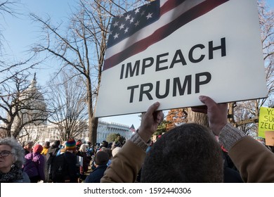 WASHINGTON, DC - DEC. 18, 2019: Some of hundreds at rally to support the impeachment of President Donald Trump at U.S. Capitol on day of House of Representatives vote on articles of impeachment.