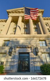 Washington DC, Department Of Commerce Building With Waving US Flag