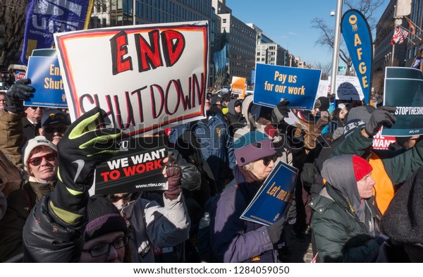 WASHINGTON,\
DC – JAN. 10, 2019: Protest of government shutdown by furloughed as\
well as unpaid working federal employees, union members,\
contractors and supporters at rally\
AFL-CIO