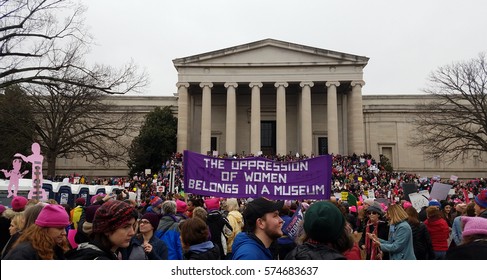 WASHINGTON DC - JAN 21, 2017: Women's March on Washington, marchers in front of the National Museum of Natural History, part of the large turnout in the anti-inauguration show of solidarity.