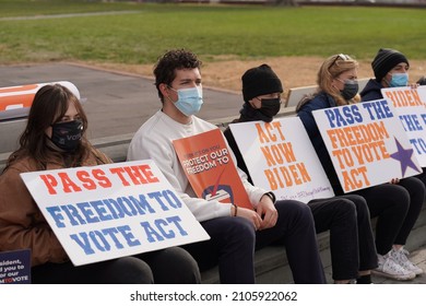 Washington, DC – January 13, 2022: Activists in support of the  Voting Rights Act legislation demonstrate with signs encouraging the Senate to pass the two bills.