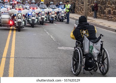 Washington, DC - January 16, 2017: Spectator In Wheelchair Snaps A Photo Of The Police Motorcycle Escorts At The Start Of The Martin Luther King, Jr. Day Peace Walk And Parade.