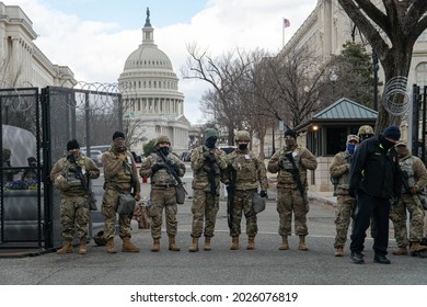 WASHINGTON, D.C. - JANUARY 20, 2021:  National Guard Troops And Capitol Police At US Capitol Entrance.