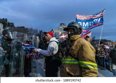 Washington, DC - January 6, 2021: Police Confront Rioters Around Capitol Building Where Pro-Trump Supporters Riot And Breached The Capitol