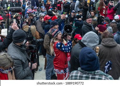 Washington, DC - January 6, 2021: Woman With Infowars Megaphone Inciting People At Capitol Building Where Pro-Trump Supporters Riot And Breached The Capitol