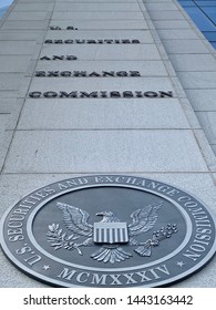 WASHINGTON, DC - JULY 5, 2019: SEC - US SECURITIES AND EXCHANGE COMMISSION - Sign Emblem Seal At Headquarters Building