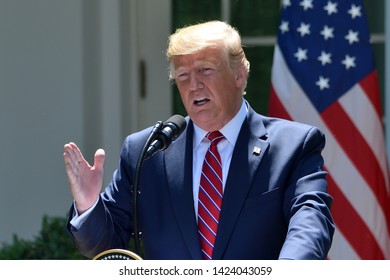 WASHINGTON, DC - JUNE 12, 2019:  President Donald Trump addresses reporters questions at a press conference in the Rose Garden of the White House with Polish President Duda.