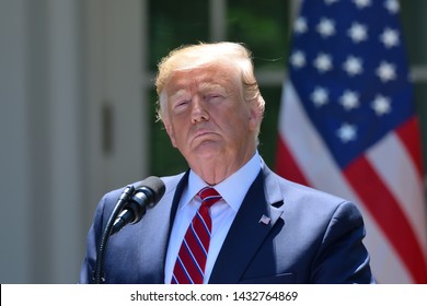 WASHINGTON, DC - JUNE 12, 2019: President Donald Trump pauses with a serious face during a press conference in the Rose Garden of the White House with Polish President Andrzej Duda.
