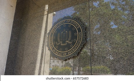 WASHINGTON, DC - JUNE 2017: Seal Of FBI On Federal Bureau Of Investigation Headquarters Building Ion Pennsylvania Ave.  Named The J. Edgar Hoover Building After The First FBI Director.