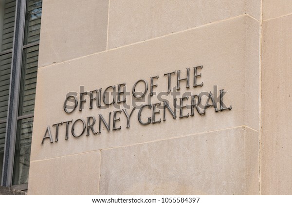 WASHINGTON, DC - MARCH 14, 2018: Office of the\
Attorney General Sign on the Department of Justice Building in\
Washington, DC