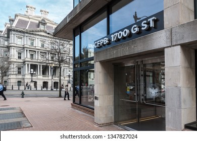 WASHINGTON, DC - MARCH 14, 2019: Consumer Financial Protection Bureau Entrance, Aka The CFPB. Eisenhower Executive Office Building In Background.