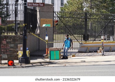 Washington, DC – March 16, 2022: An Amazon Delivery Driver Delivers Packages To The Russian Embassy.                      