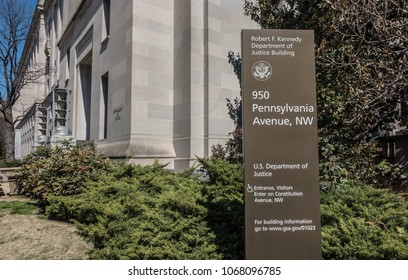 WASHINGTON, DC - MARCH 2018: Headquarters Of The U.S. Justice Department.  Art Deco Aluminum Torcheres At Doorway.  Renamed The Robert F. Kennedy Department Of Justice Building In 2001.