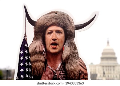 Washington, DC – March 25, 2021: Facebook CEO Mark Zuckerberg portrayed as the QAnon shaman before a Congressional hearing on the role social media played in the January Insurrection.    