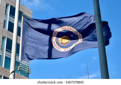 WASHINGTON, DC - MAY 25, 2019: NASA Flag Outside Headquarters Building