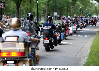 WASHINGTON, DC - MAY 25: Motorcycles travel in DC as part of the annual Rolling Thunder motorcycle Ride for Freedom for American POWs and MIA soldiers on May 25, 2014 in Washington, DC.